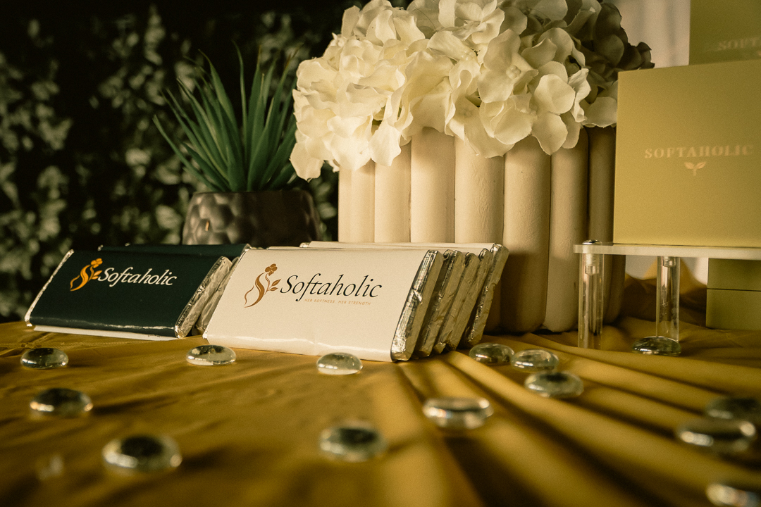 Softaholic branded keepsakes on a gold table setting